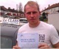 Joe with Driving test pass certificate