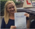 Justyna with Driving test pass certificate