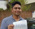 Imdad with Driving test pass certificate