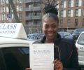 Jennifer with Driving test pass certificate