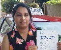 Geeta with Driving test pass certificate