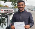 Melbin with Driving test pass certificate