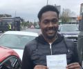 Darrell with Driving test pass certificate