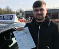 Igor with Driving test pass certificate