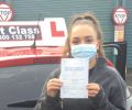 Mariann with Driving test pass certificate
