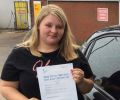 Patrycja with Driving test pass certificate